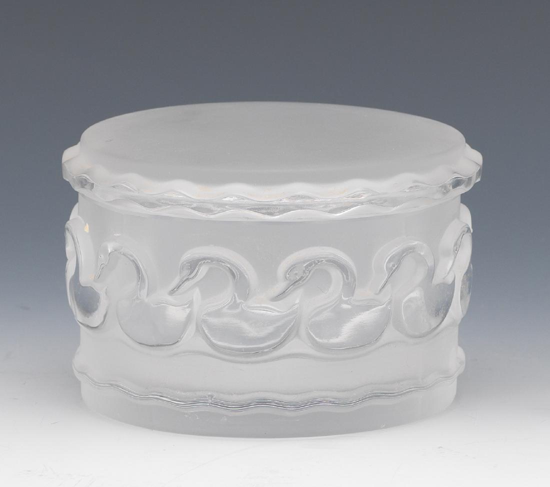 Lalique Lidded Swan Jar: Lalique Lidded Swan Jar With band of swans. Etched Lalique France Size 2 1/2 x 4 in. If you would like to receive more detailed photos, please let us know. We do not accept credit card charges of over