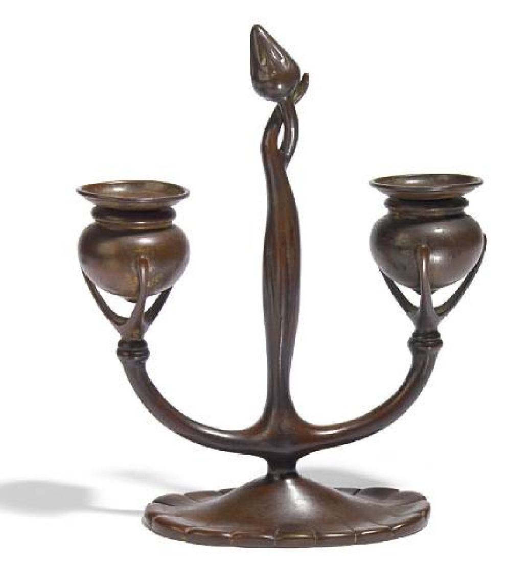 Early Tiffany Studios Bronze Double Arm Candelabrum: Early Tiffany Studios Bronze Double Arm Candelabrum 1899-1918 Faintly impressed TIFFANY STUDIOS NEW YORK 1230 and with the firm's monogram Height 9 1/8 in (23.3cm) If you would like to receive more de