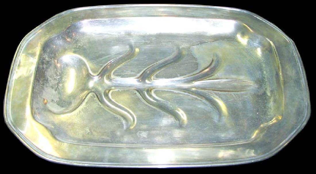 FOOTED SERVING PLATTER ROGERS SILVER CO 1883: FOOTED SERVING PLATTER ROGERS SILVER CO 1883 American silver plate footed platter marked 1883 F.B. ROGERS SILVER CO. TAUNTON MASS SILVER ON COPPER 1104. Tray is need cleaning. The size of the platter