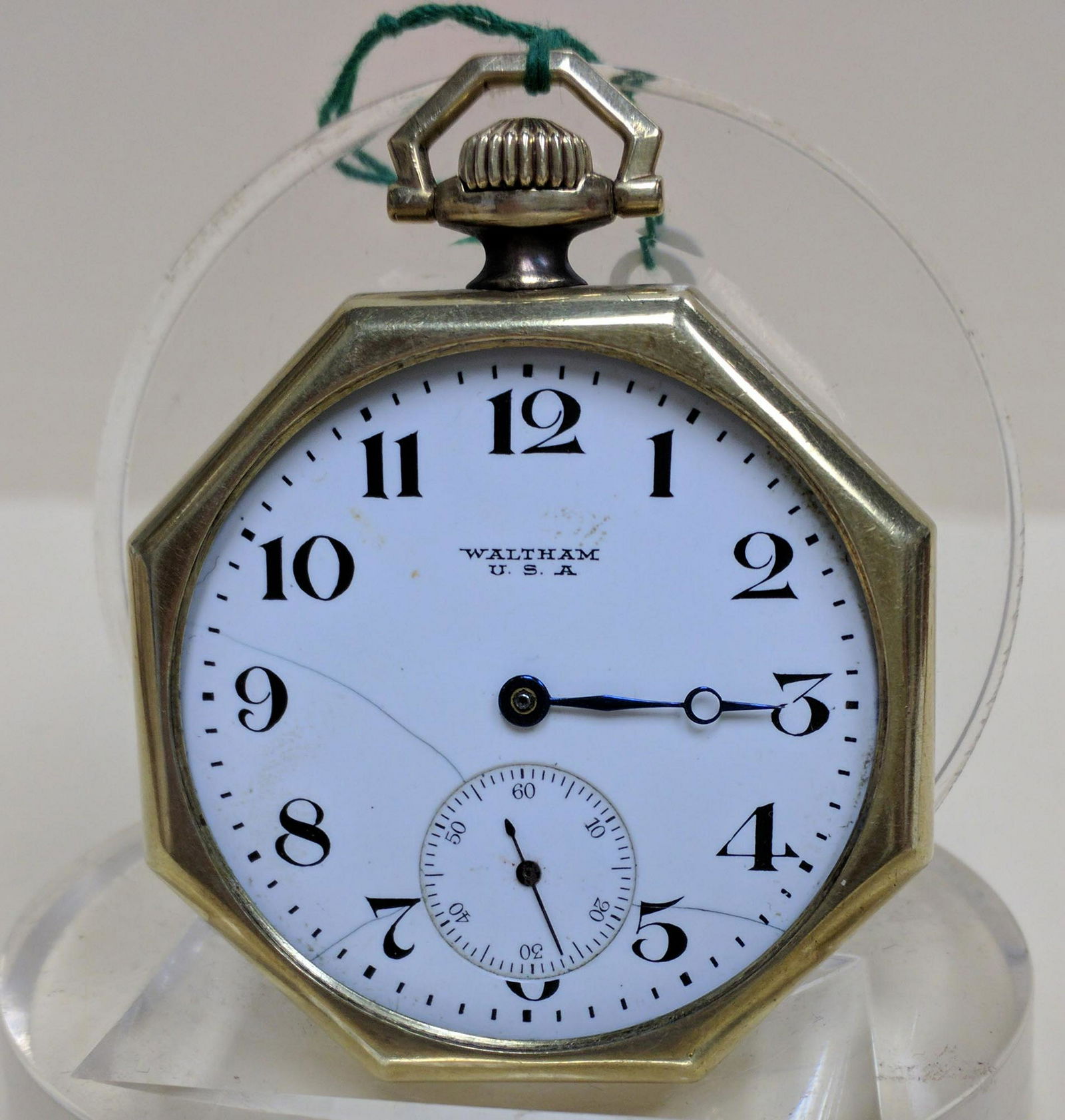 Pocket watch A.W.W. Co. Waltham Mass Pocket Watch: Pocket watch A.W.W. Co. Waltham Mass Pocket Watch Rare octagonal 14k yellow gold open face swing out case packet watch by Waltham. Dial signed Waltham USA circa 1920’s Inside case back is marked: El