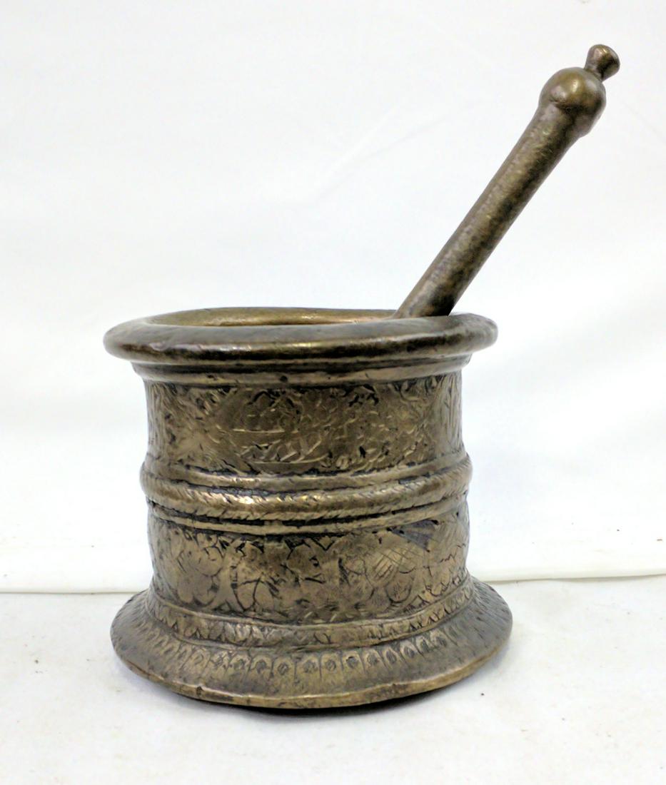 19 Century Persian Islamic Bronze Mortar: 19 Century Persian Islamic Bronze Mortar Persia, 19th century, decorated with bands of calligraphy and floral motifs. Size: ht. 4 3/4 in. If you would like to receive more detailed photos, please let