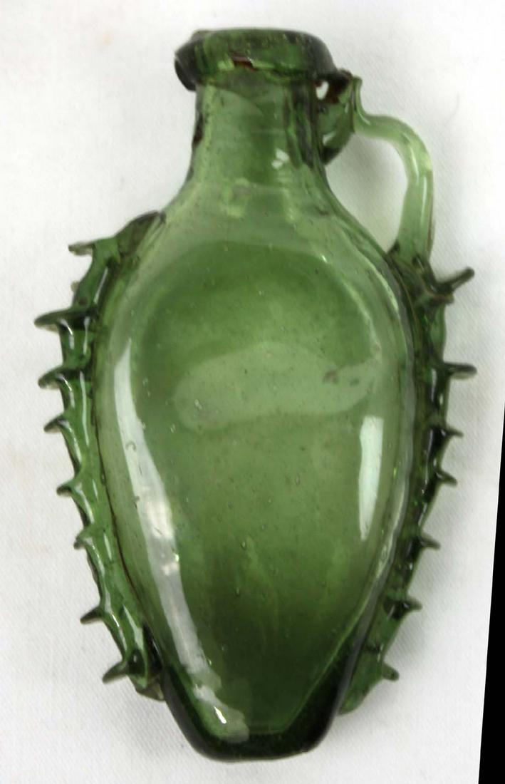 Spanish 17 Century Glass Bottle: Spanish 17 Century Glass Bottle Size: Height 4 in. 2 1/2 in. wide If you would like to receive more detailed photos, please let us know. We do not accept credit card charges of over $7,500, this amoun