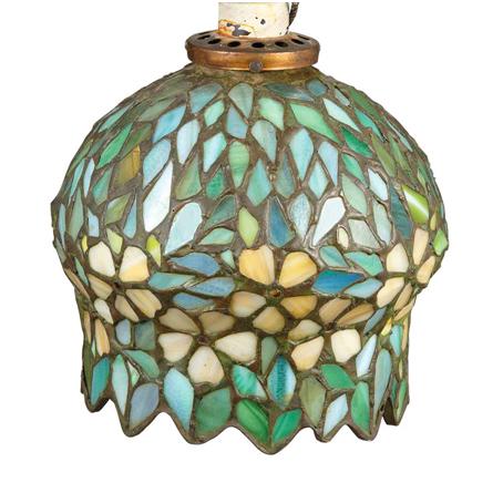 American Leaded Glass Shade: American Leaded Glass Shade First quarter of the 20th century. Attributed to Apollo Studios New York, Of blossom form, in striated amber, green and blue, irregular rim. Size: Height 7 1/8 inches. If y
