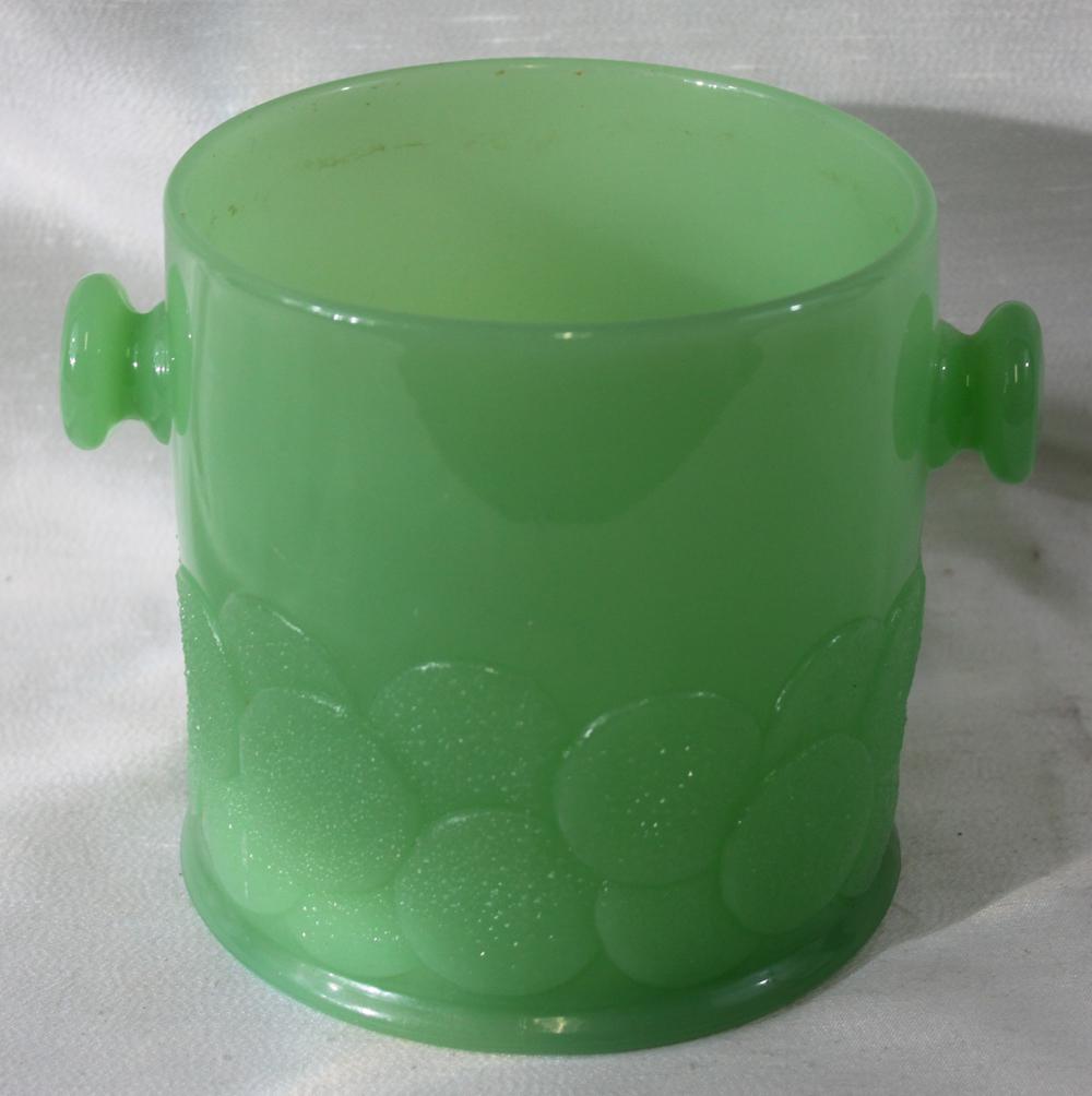 GREEN OPALINE GLASS BOWL WITH HANDLE: GREEN OPALINE GLASS BOWL WITH HANDLE Cylindrical bowl with handle and decorations Condition: in perfect condition Size: 5 1/2 H x 7 1/4 in. W. If you would like to receive more detailed photos, please