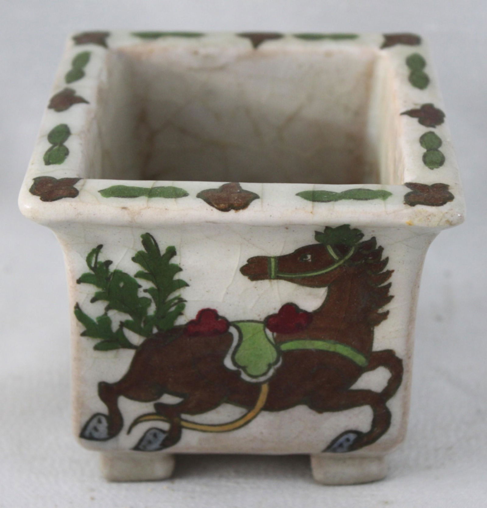 Islamic Persian Ceramic Planter: Islamic Persian Ceramic Planter Size: 4 in x 4 in x 3 1/2 in. Please be aware that packing and shipping costs are not included. Free pickup is available with an appointment. Items not arranged to be p