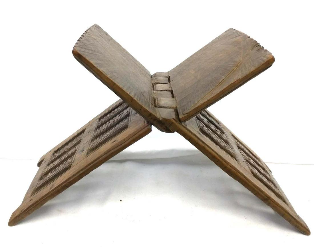 AN OPENWORK AND CARVED WOODEN QUR'AN STAND (1 of 6)