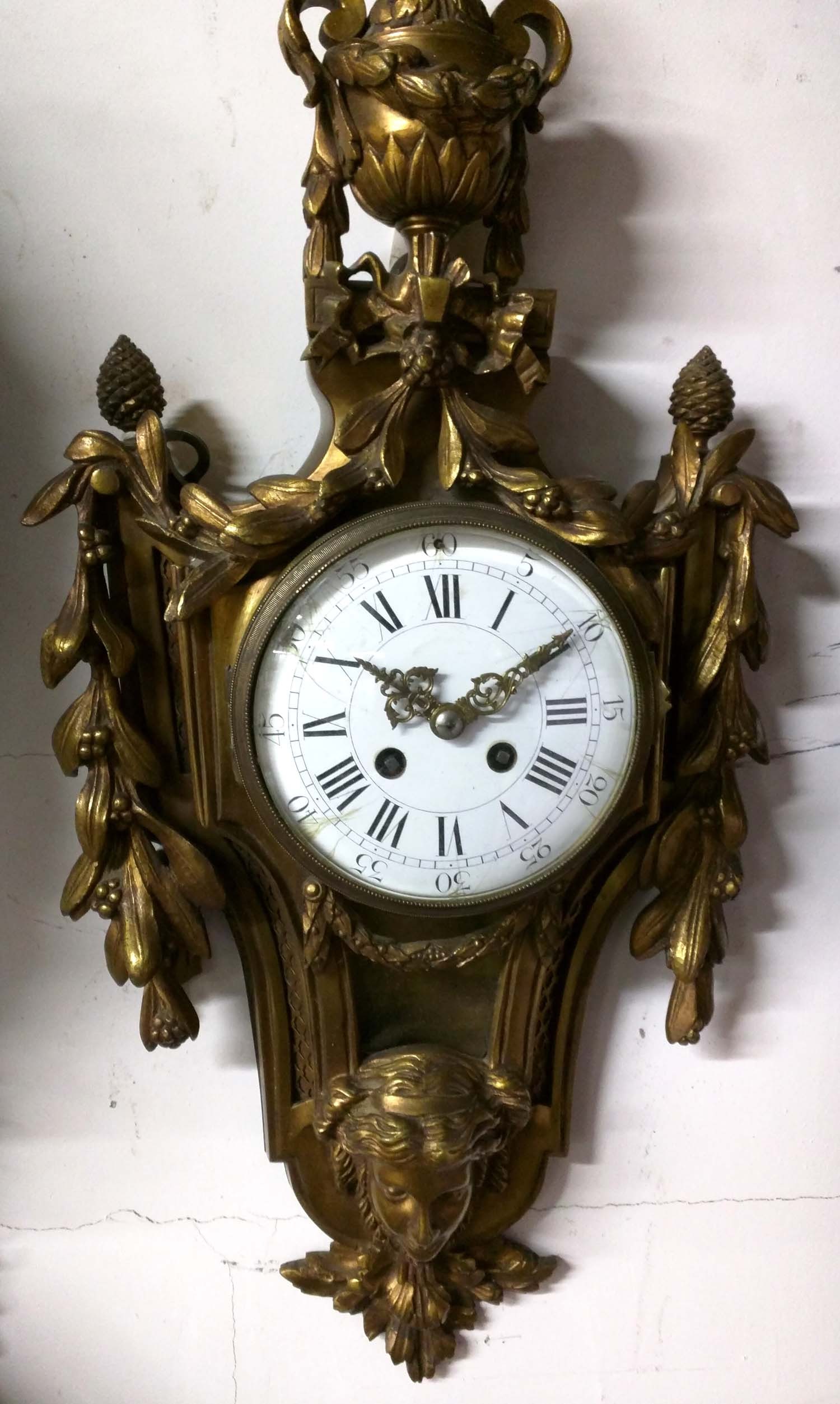 Large French Bronze Cartel Wall Clock with Original Pendulum: Large French Bronze Cartel Wall Clock with Original Pendulum Impressive 19th century French bronze cartel wall clock, featuring a richly cast case adorned with neoclassical motifs including laurel gar
