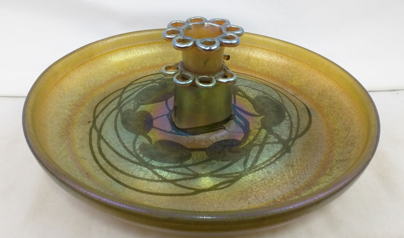 Louis Comfort Tiffany Favrile Glass Centerpiece with Flower Frog: Louis Comfort Tiffany Favrile Glass Centerpiece with Flower Frog Favrile glass centerpiece by :contentReference[oaicite:0]{index=0}, featuring an iridescent gold ground with applied blue and green Fav