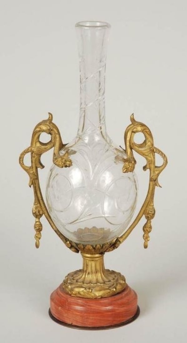 French Ormolu-Mounted Cut Crystal Vase on Rouge Marble Base, 19th Century: French Ormolu-Mounted Cut Crystal Vase on Rouge Marble Base, 19th Century Elegant baluster-form vase of clear cut crystal, featuring spiral and etched foliate decoration, mounted in an ornate gilt bro