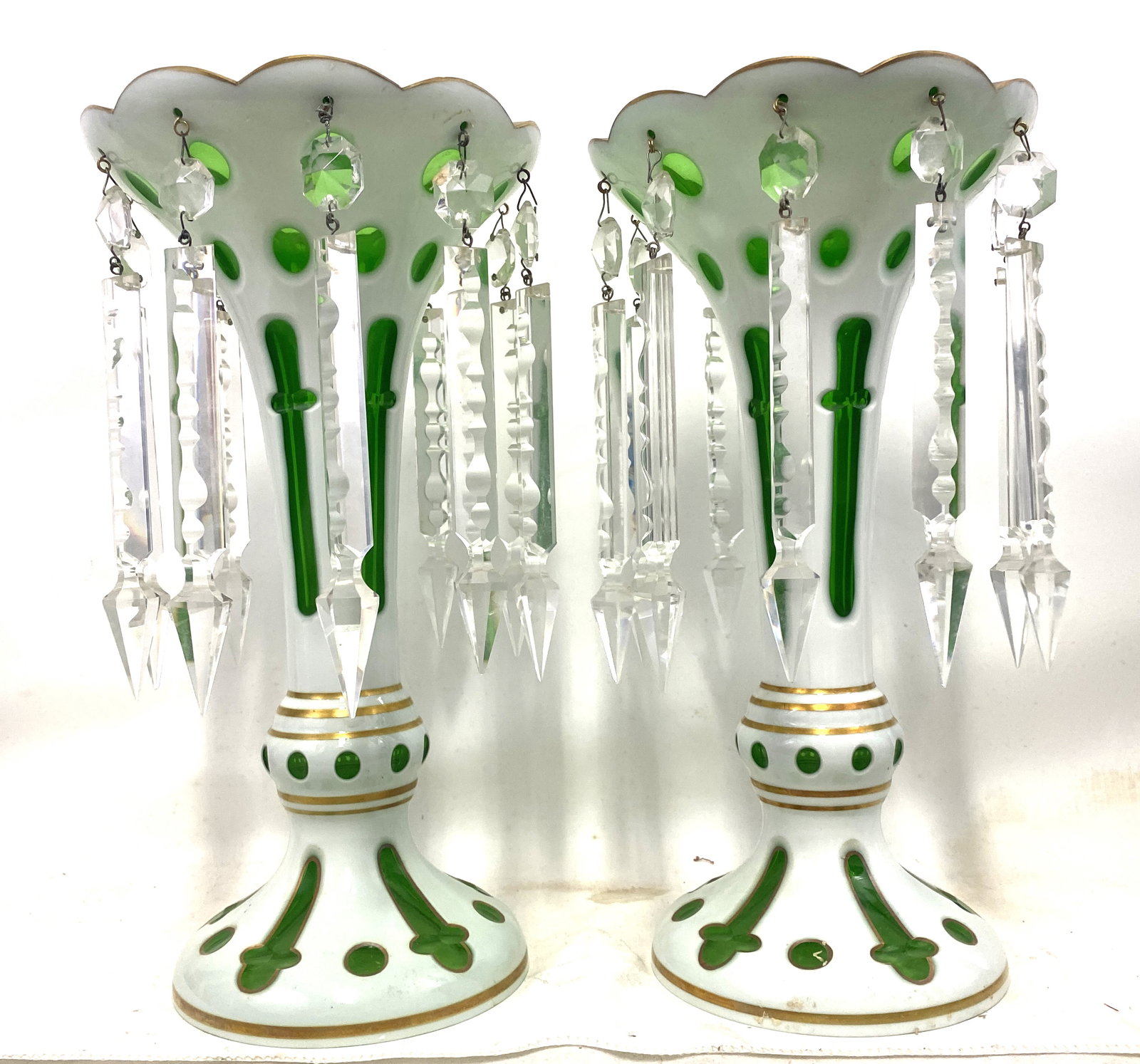 Antique Pair of Bohemian Glass Mantel Lusters: Antique Pair of Bohemian Glass Mantel Lusters Height: 12 inches (30.5 cm) Elegant pair of 19th-century Bohemian mantel lusters in white overlay glass with vibrant green cut-to-clear decoration and han