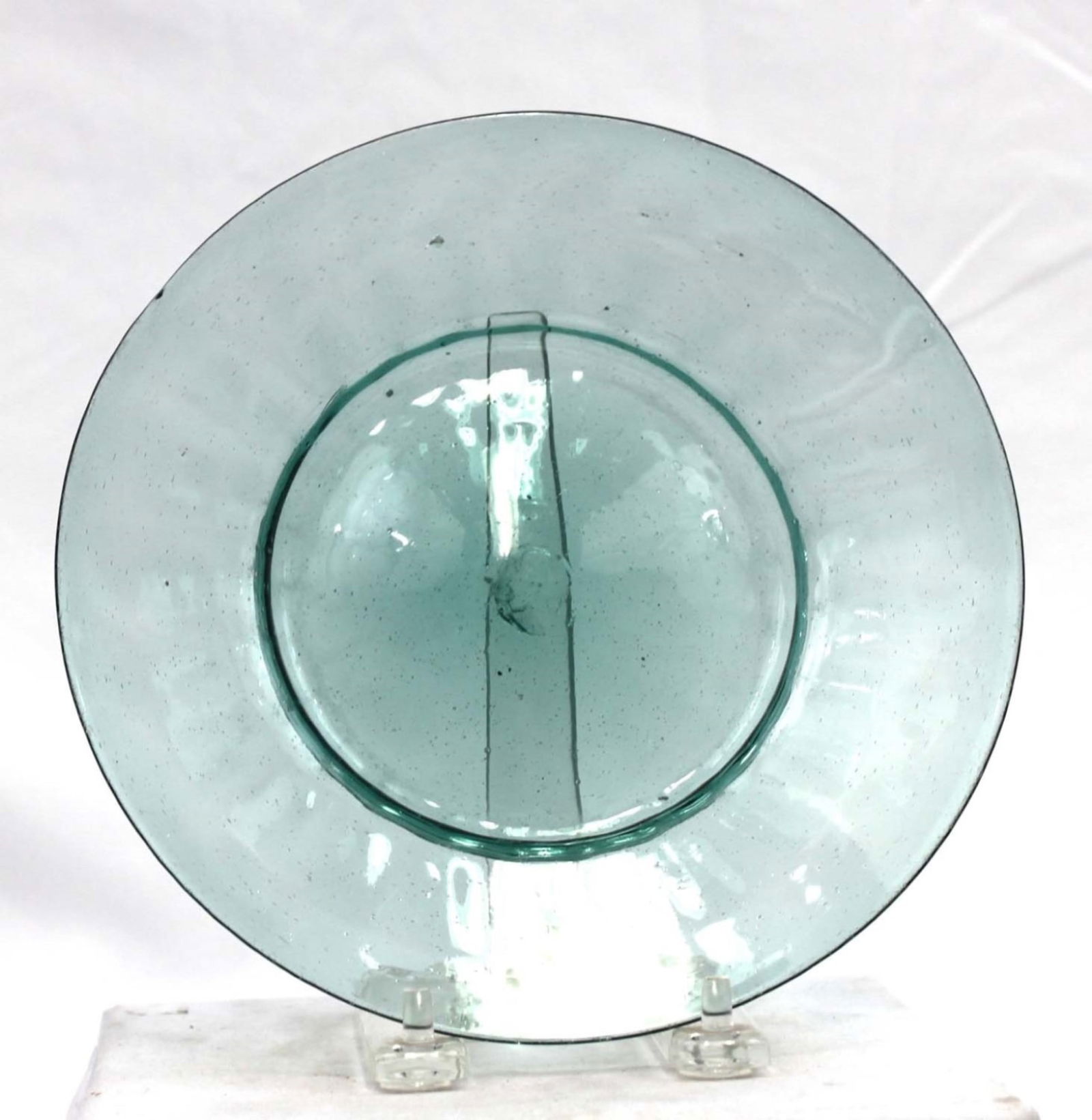 Continental Hand-Blown Aqua Glass Plate, 18th-Early 19th Century: Continental Hand-Blown Aqua Glass Plate, 18th-Early 19th Century Hand-blown pale aqua glass plate / small dish, the circular form with a shallow well and broad rim. Showing elongated blowing striation