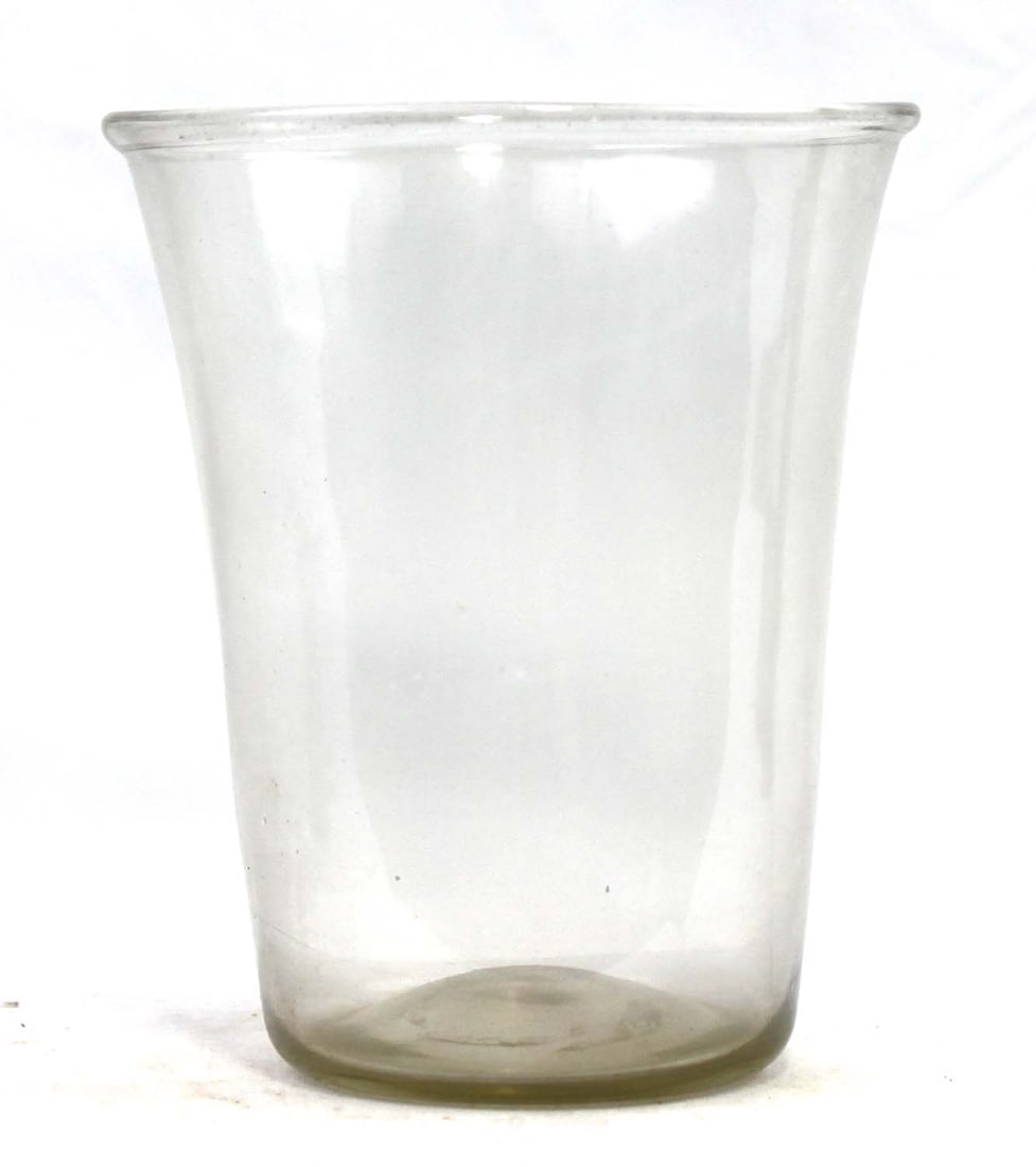English or Continental Blown Glass Tumbler / Beaker, late 18th-early 19th century: English or Continental Blown Glass Tumbler / Beaker, late 18th-early 19th century Clear hand-blown glass tumbler of straight-sided form with a subtle flared rim and thickened base, exhibiting light wa