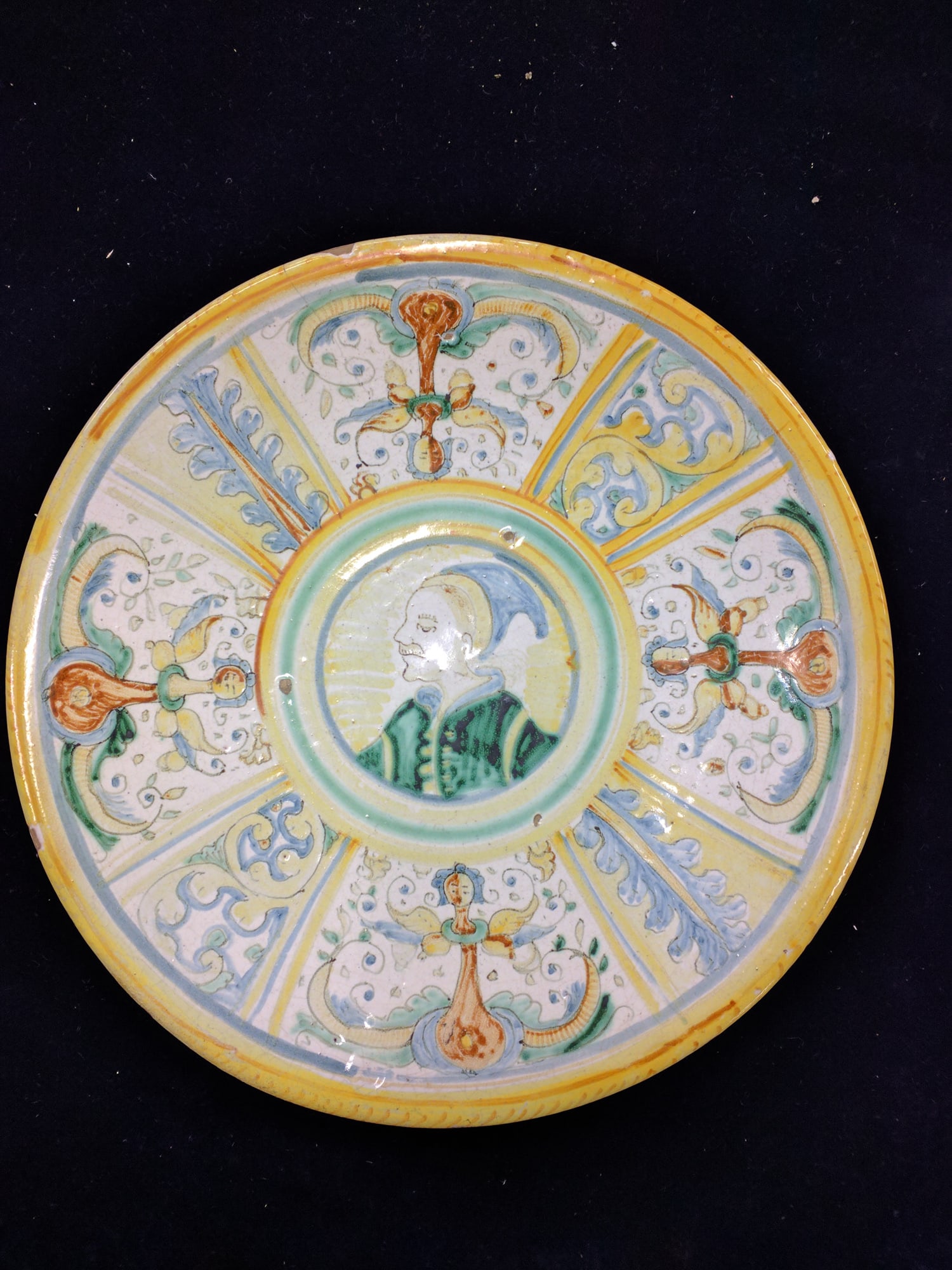 Italian Renaissance Revival Majolica Charger with Classical Portrait, Urbino Manner: Italian Renaissance Revival Majolica Charger with Classical Portrait, Urbino Manner Italian Renaissance Revival, circa 1880-1920. Fine hand-painted tin-glazed earthenware (majolica) charger, closely i