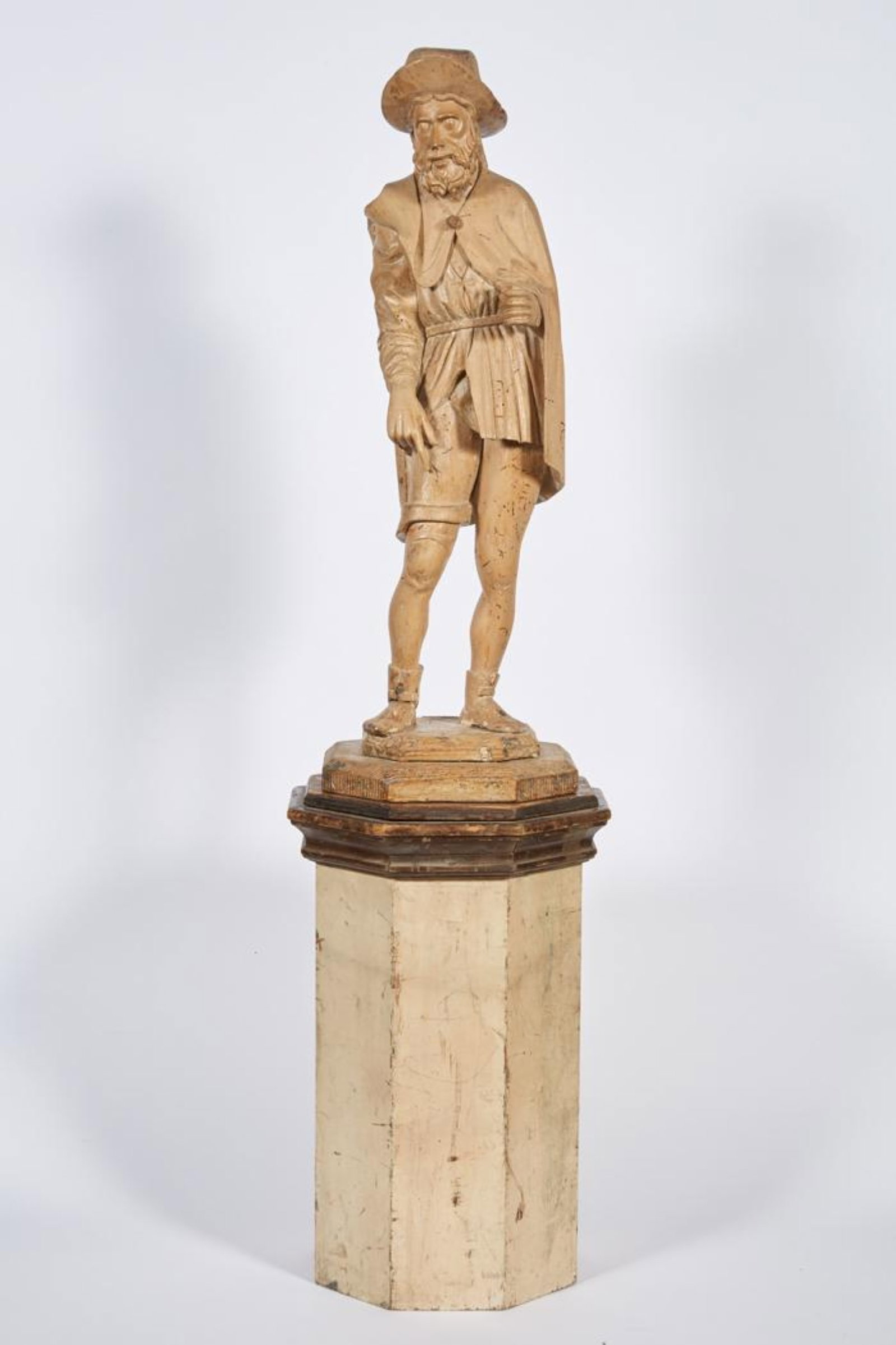 Late 16th / Early 17th Century Northern European Carved Wood Pilgrim Figure: Late 16th / Early 17th Century Northern European Carved Wood Pilgrim Figure Carved wood figure depicting a pilgrim, likely representing Saint James the Greater (Santiago) or a generalized pilgrimage