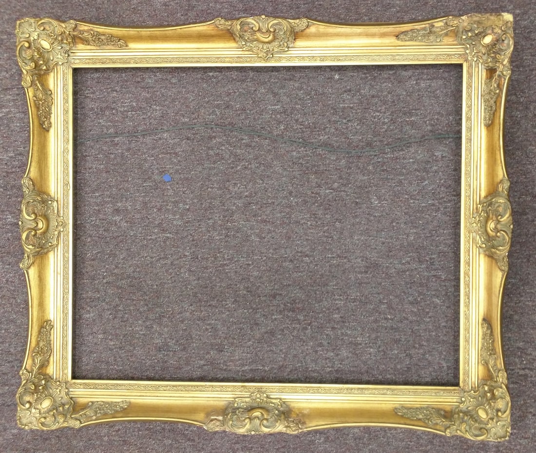 French Louis XV Style Giltwood Picture Frame, Early 20th Century: French Louis XV Style Giltwood Picture Frame, Early 20th Century French Louis XV / Rococo Revival style giltwood frame, early 20th century (circa 1900-1935), with shaped rails, corner rocaille and
