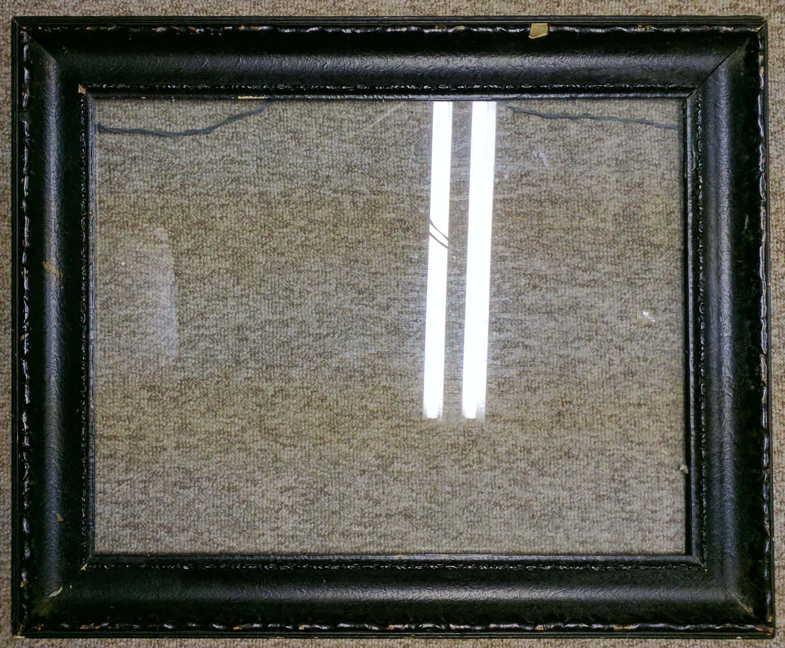 strong>19th Century Leather-Covered Stitched Frame, 17 x 22 in. (Sight): 19th Century Leather-Covered Stitched Frame, 17 x 22 in. (Sight) Antique leather-covered wood frame, the black leather (or leatherette) molding with hand-stitched detailing along the inner and outer e