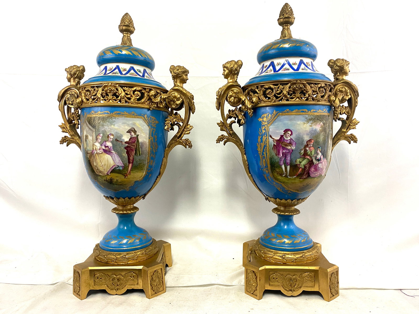 Large Pair of 19th Century French Sevres-Style Porcelain Vases with Covers: Large Pair of 19th Century French Sevres-Style Porcelain Vases with Covers This impressive and finely crafted pair of 19th-century French porcelain vases is executed in the Sevres style, notable for i
