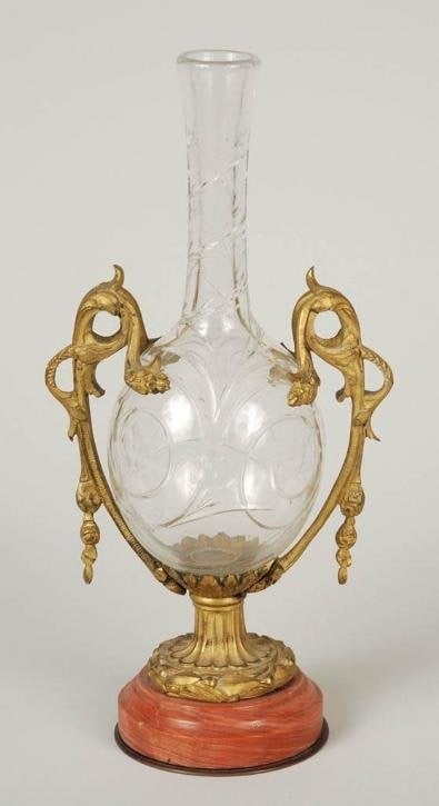 French Ormolu-Mounted Cut Crystal Vase on Rouge Marble Base, 19th Century: French Ormolu-Mounted Cut Crystal Vase on Rouge Marble Base, 19th Century Elegant baluster-form vase of clear cut crystal, featuring spiral and etched foliate decoration, mounted in an ornate gilt bro
