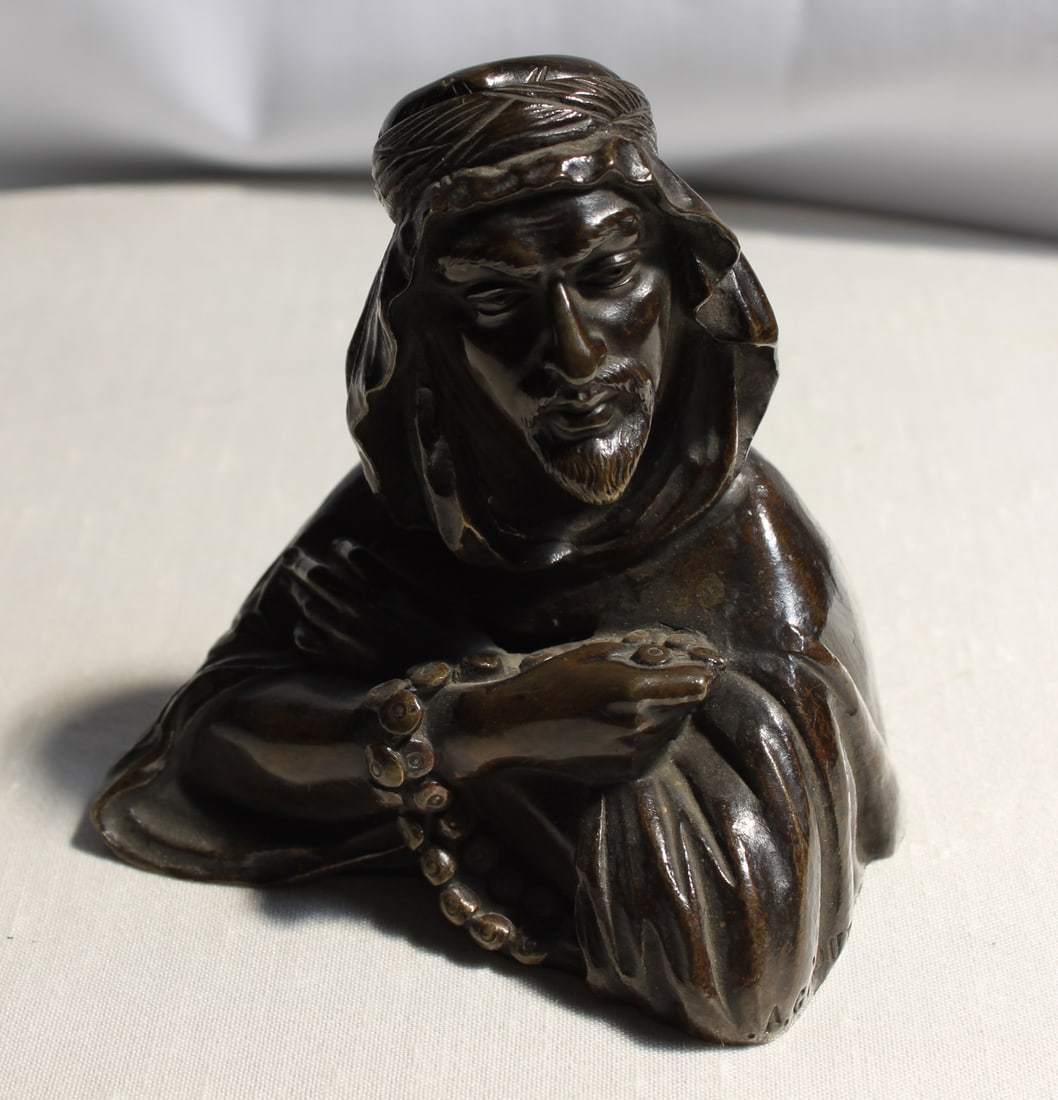 Orientalist Bronze Bust by A. Giroux: Orientalist Bronze Bust by A. Giroux Finely cast bronze bust depicting an Orientalist figure wearing a turban and holding prayer beads, signed A. Giroux on the base. Alphonse Giroux (1776-1848) was th