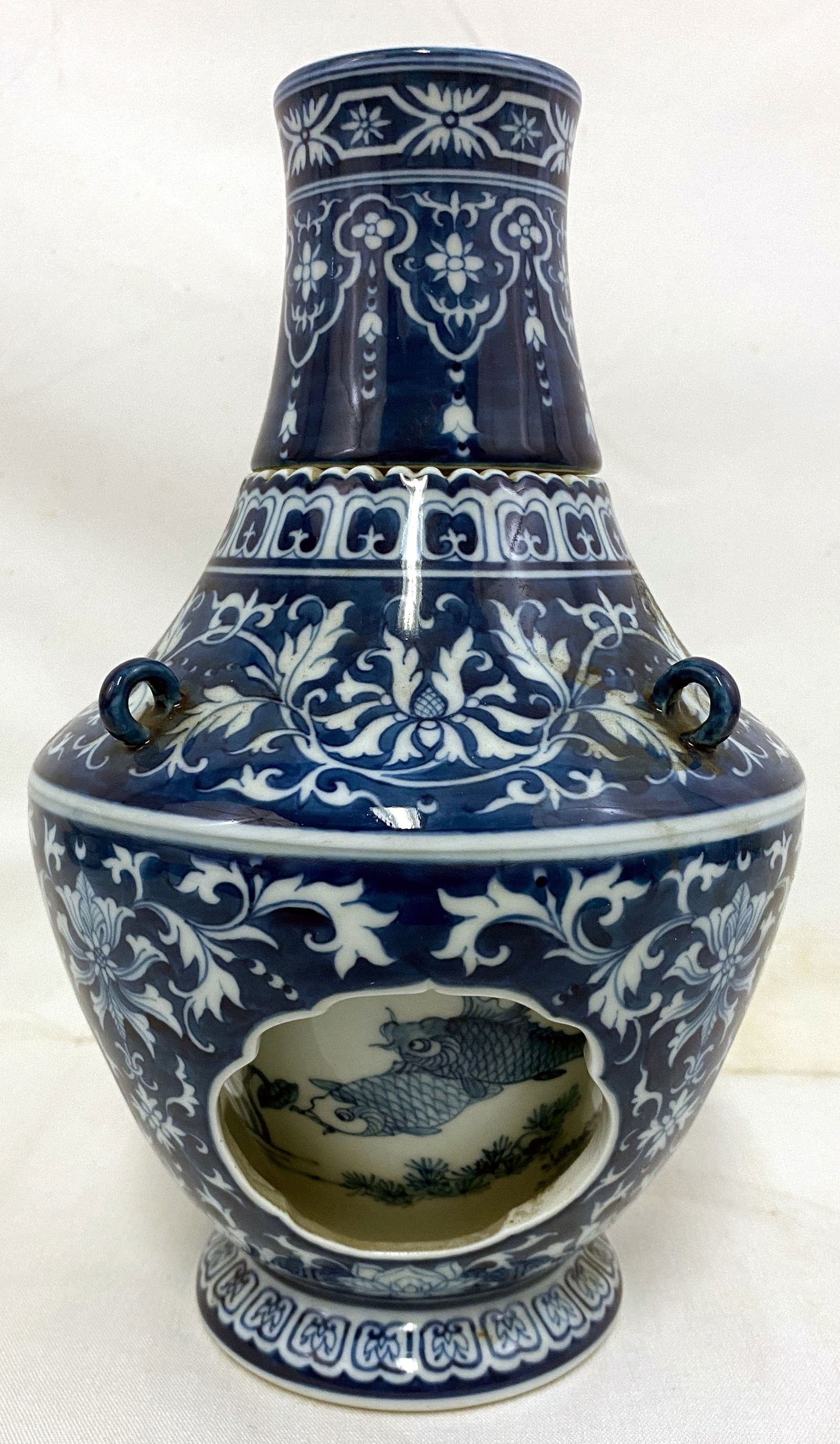Chinese Blue and White Porcelain Revolving Vase: Chinese Blue and White Porcelain Revolving Vase Chinese Blue and White Porcelain Revolving Vase China, circa 1970s. Finely hand-painted in underglaze blue with stylized lotus scrolls, floral borders,