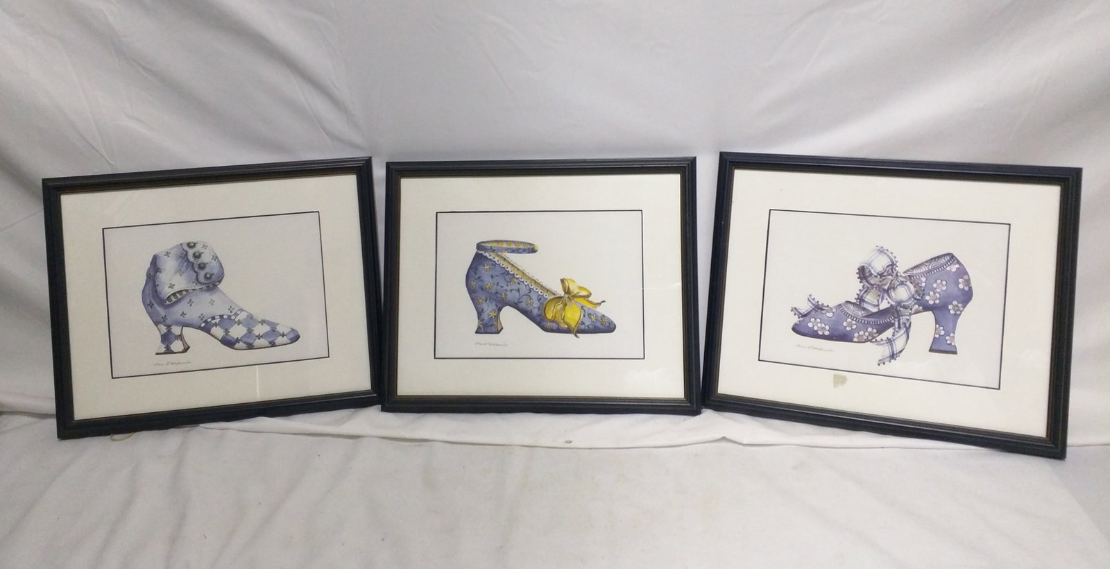 Dora T. Sweetbauer, Set of Three Framed Shoe Illustrations: Dora T. Sweetbauer, Set of Three Framed Shoe Illustrations Watercolor and ink on paper Each signed lower margin: Dora T. Sweetbauer Charming set of three whimsical shoe illustrations, rendered in fine