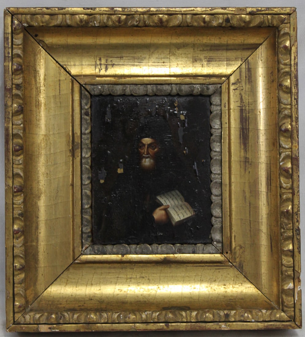 Late 18th Century Eastern Orthodox Icon of a Monk-Saint, Oil on Wood: Late 18th Century Eastern Orthodox Icon of a Monk-Saint, Oil on Wood Oil on wood panel depicting a bearded monk-saint holding an open book, rendered in a dark palette with finely modeled facial featur