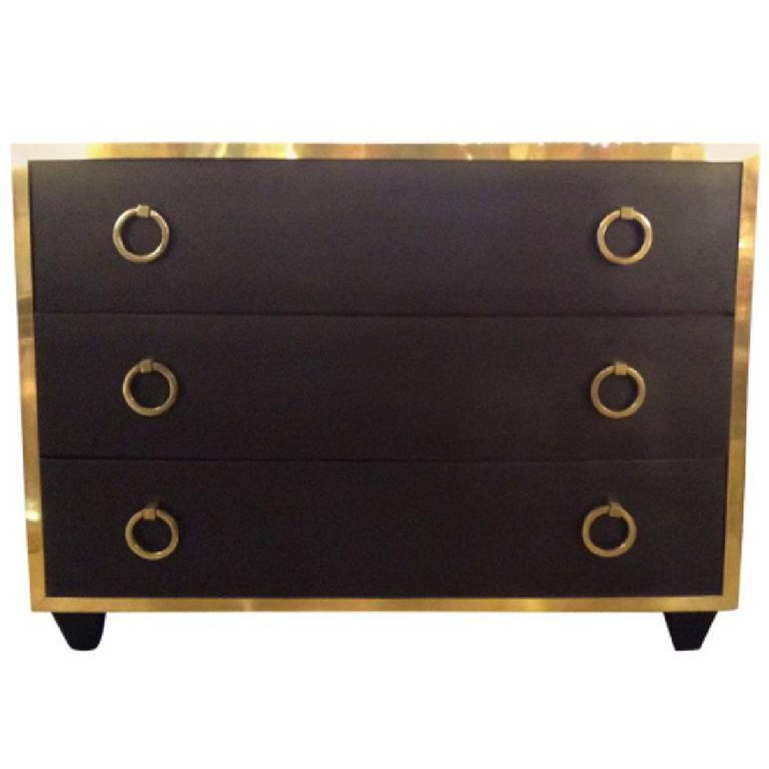 Goat Skin Brass Italian Luxury Goatskin and Brass: Luxury designs exclusive handmade custom and luxury furniture made from parchment goatskin, shagreen, Horn, bone, and brass. Bold but refined, this commanding storage chest is composed of hand-polishe