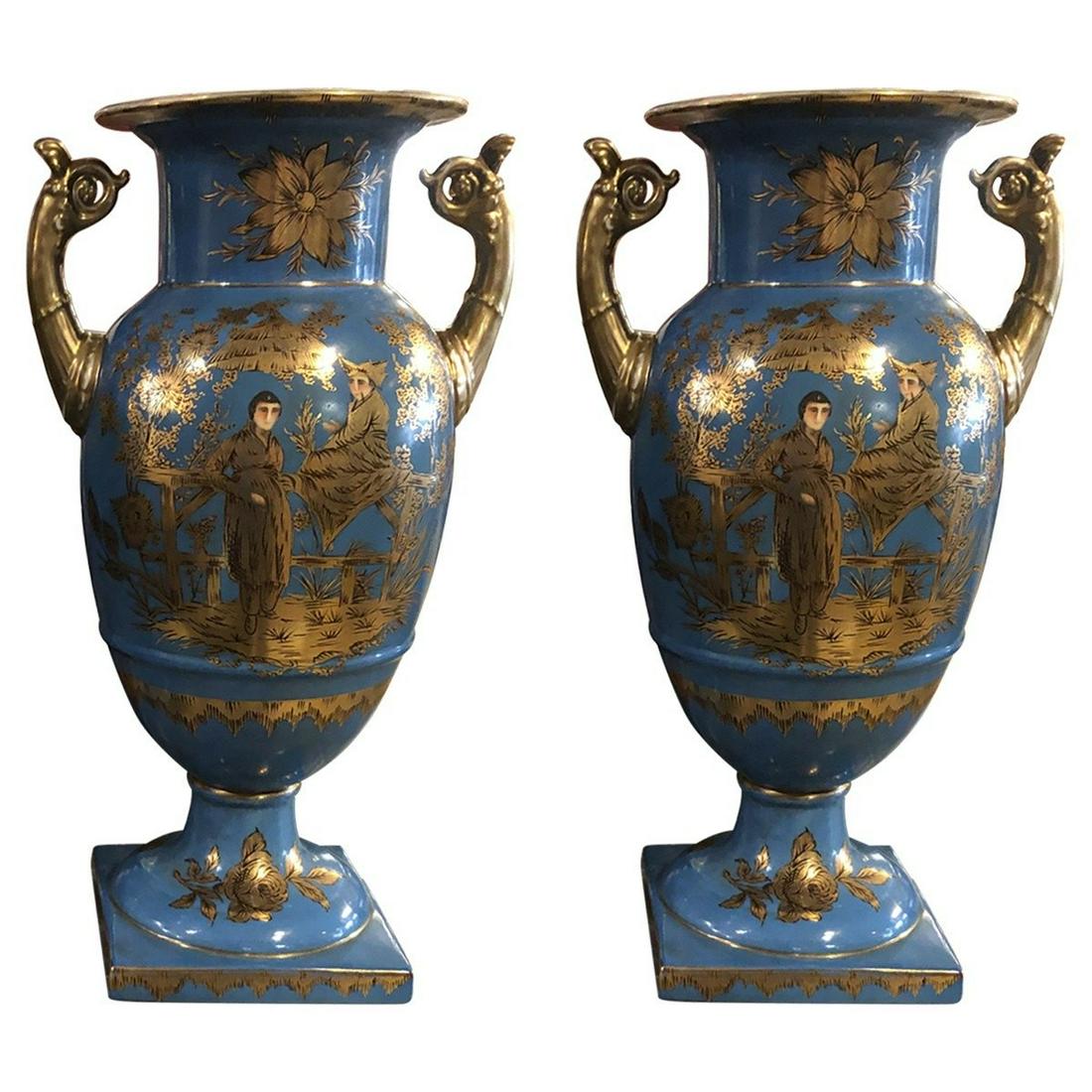 Hollywood Regency Handled Vases Mid-20th Century: Bring the flavor of Asia to your home, with this gorgeous set of vases. Featuring Chinoiserie decoration, the vase shows off parcel gilt and turquoise coloring. Add fresh flowers or leave empty for a