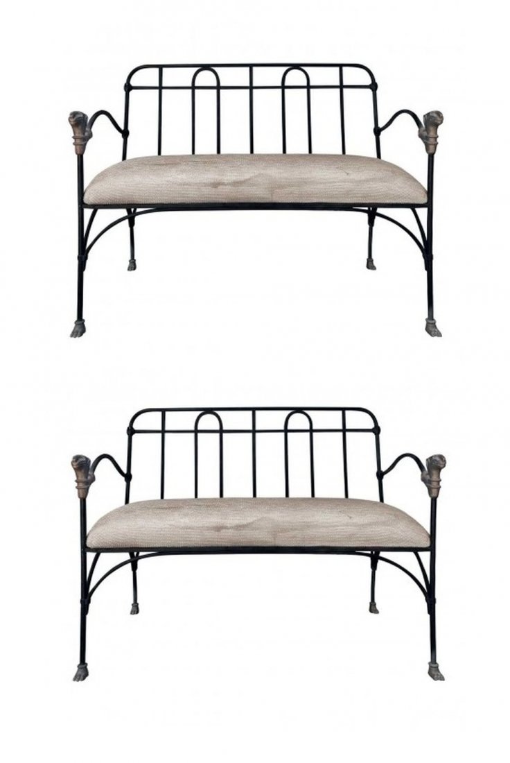 J-Art Iron Co Settees With Lion Heads: "Two painted iron settees with upholstered seats.Bronze lion head accented finials at arms, and paw feet.MaterialsIron, Bronze, FabricDimensionsWidth 39""Depth 22""Height 33.50""Arm Height 26.50""Seat