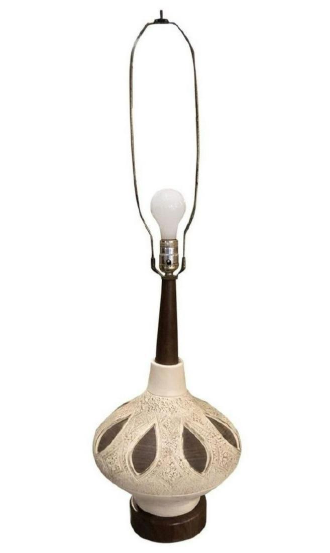 Mid-Century Modern Bulbous Table Lamp Mid-20th Century: Mid-Century Modern broadly describes architecture, furniture, and graphic design from 1950s and 1960s post-war America. Influenced by Scandinavian minimalism, MCM style features organic, quirky geomet