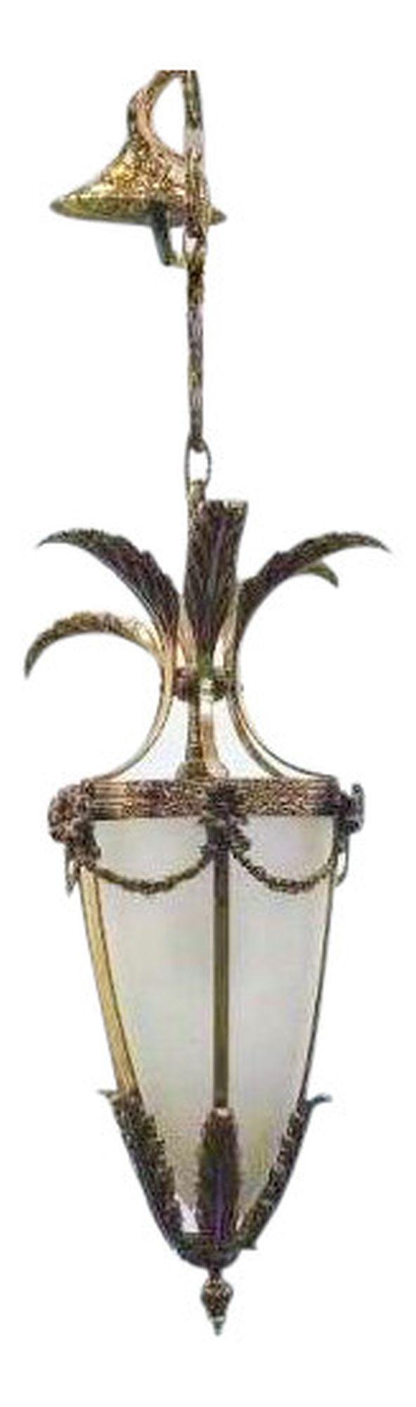 1940s French Brass and Glass Pendant: 1940s brass and glass Chandelier or hanging Pendant. The brass is in a floral design all along the top rim of the chandelier with leaflets protruding from the bottom and top of the lighting. DIMENSION