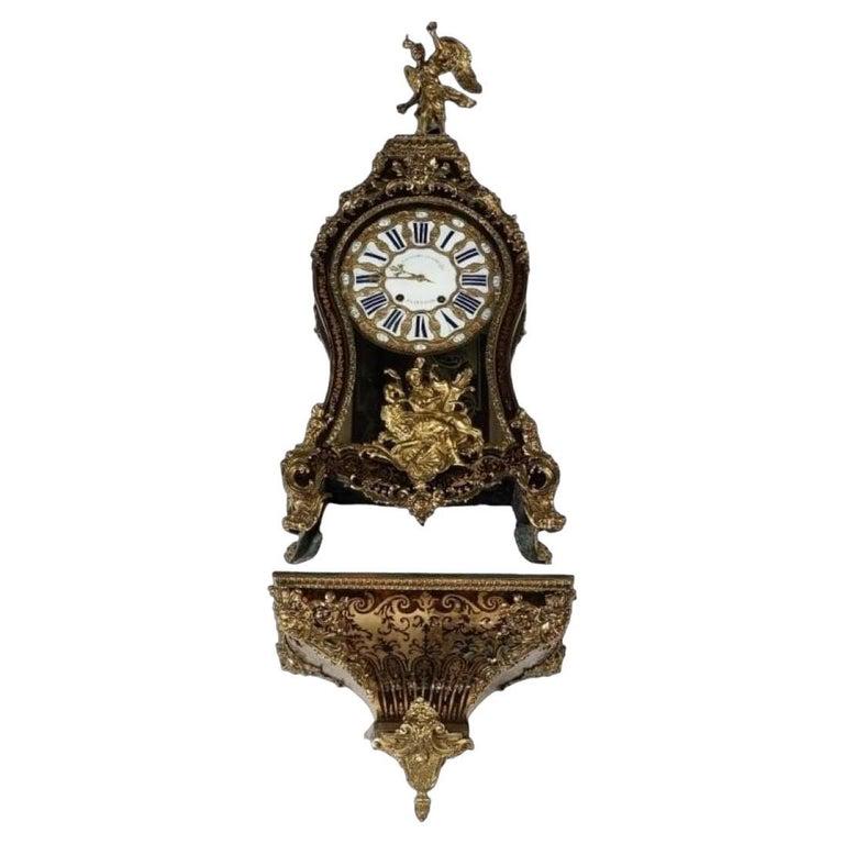 19thc Exquisite Monumental French Boulle Clock wPedestal: 19thc Exquisite Monumental French Boulle Turtle shell Clock wPedestal by Toussaint Lenoire. Measurements are approximate - mantel clock 19w x 7.5d x 42h , wall bracket 19w x 9d x 15hPendulum with key