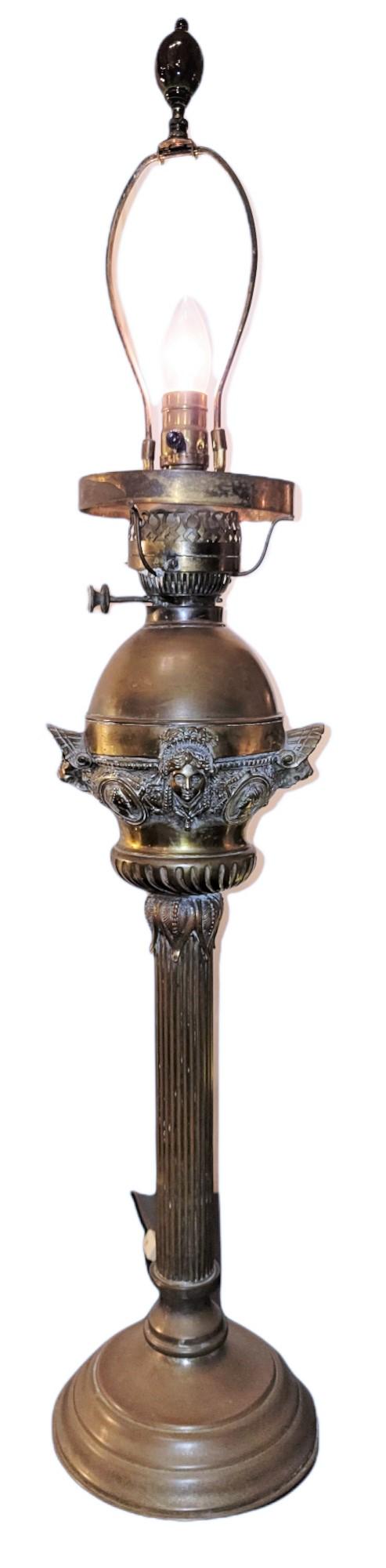 Metal table Lamp with Brass Design: Metal table Lamp with Brass Design. Measures approx - 44h x 8 w x 8 d