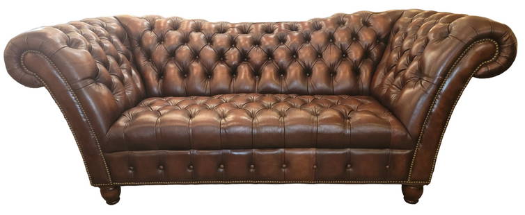 English Reverse Camelback Chesterfield Three Seat Tufted Sofa: English reverse camel back tufted brown leather three seat sofa with wonderful, rolled arms with original buttons. The Brown leather is in great condition. Such a soft and comfortable seat design with