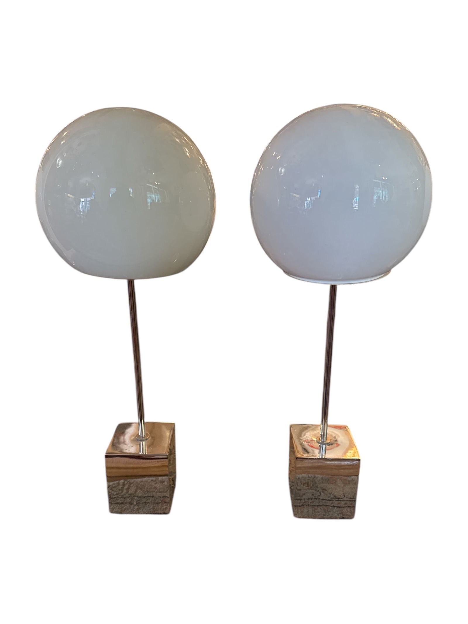 Pair Of Chrome Lollipop Table Lamp by Robert Sonneman: The Chrome Lollipop Table Lamp by renowned designer Robert Sonneman is a striking blend of modern elegance and playful design. With its bold, minimalist aesthetic, this lamp stands out as a true state