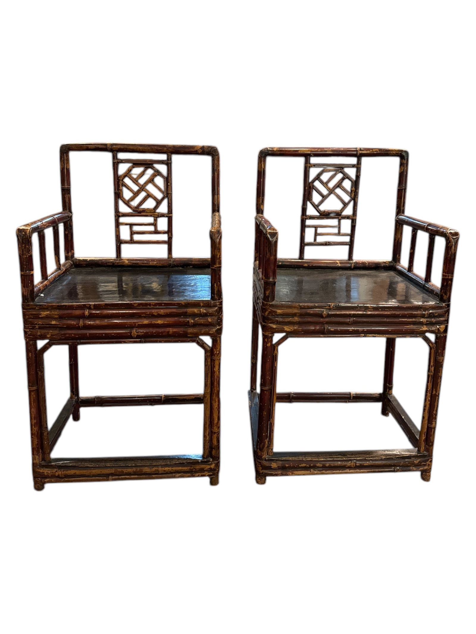 Pair of Early 20th Century Chinese Bamboo Chairs: Add a touch of Eastern elegance and natural beauty to your home with this Pair of Early 20th Century Chinese Bamboo Chairs. Crafted with traditional Chinese craftsmanship, these chairs showcase the ex