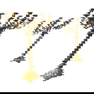 Pair of 7 Light Bronze Candelabras: Pair of 7 Light Bronze Candelabras Bronze Gilt bronze.Six detachable arms.Decorated with scrollwork, foliage and flowers.DimensionsHeight 31"Diameter 24"