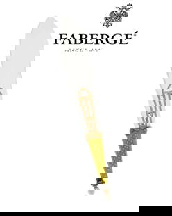 Michael Perkhin for Faberge: A Late 19th Century Bi-Color Gold, Rock Crystal Quartz and Enamel: Featuring a graduated rock crystal quartz finished with a yellowish green wave like enamel patter, accented with etched green and rose gold, with a rose-cut diamond and pearl tip, with maker's marks a