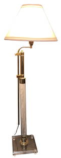 Charles Hollis Jones Lucite and Brass Floor Lamp: 1960s Charles Hollis Jones Lucite Lamp With Brass accessories. This Lucite floor lamp offer a wonderful low of light that reflects from the Lucite frame. The brass glows from the lighting provided fro