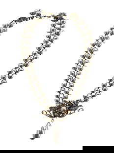 Signed Mariam Haskell Baroque Vintage Faux Pearl Pendant Necklace: Step into timeless elegance with this stunning signed Miriam Haskell vintage necklace, a magnificent example of the designer’s celebrated craftsmanship. This exquisite piece features two strands of