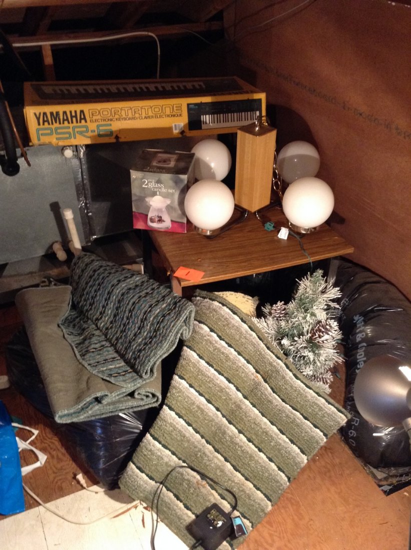 Yamaha Portatone, light fixture, rugs: Yamaha Portatone, light fixture, rugs, Corner of attic everything goes.