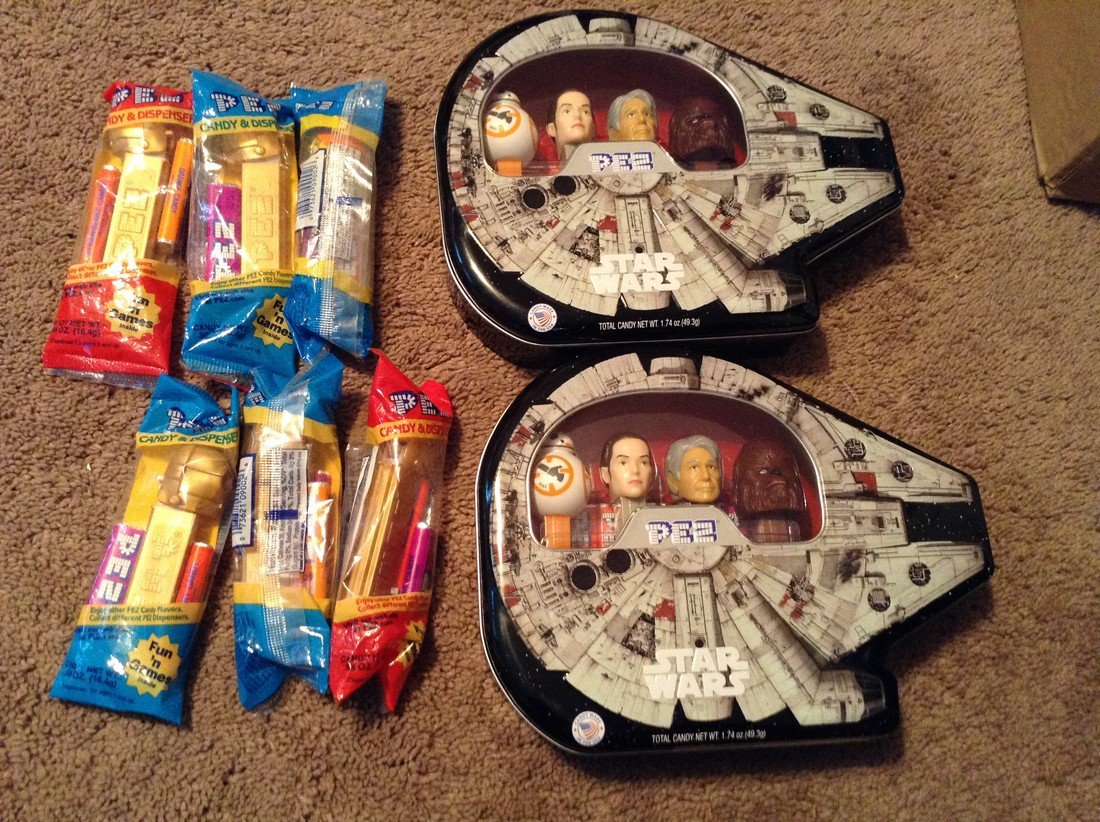 Various PEZ Dispensers: Various PEZ Dispensers including; Star Wars collector tins and various others as seen in photos new in packages