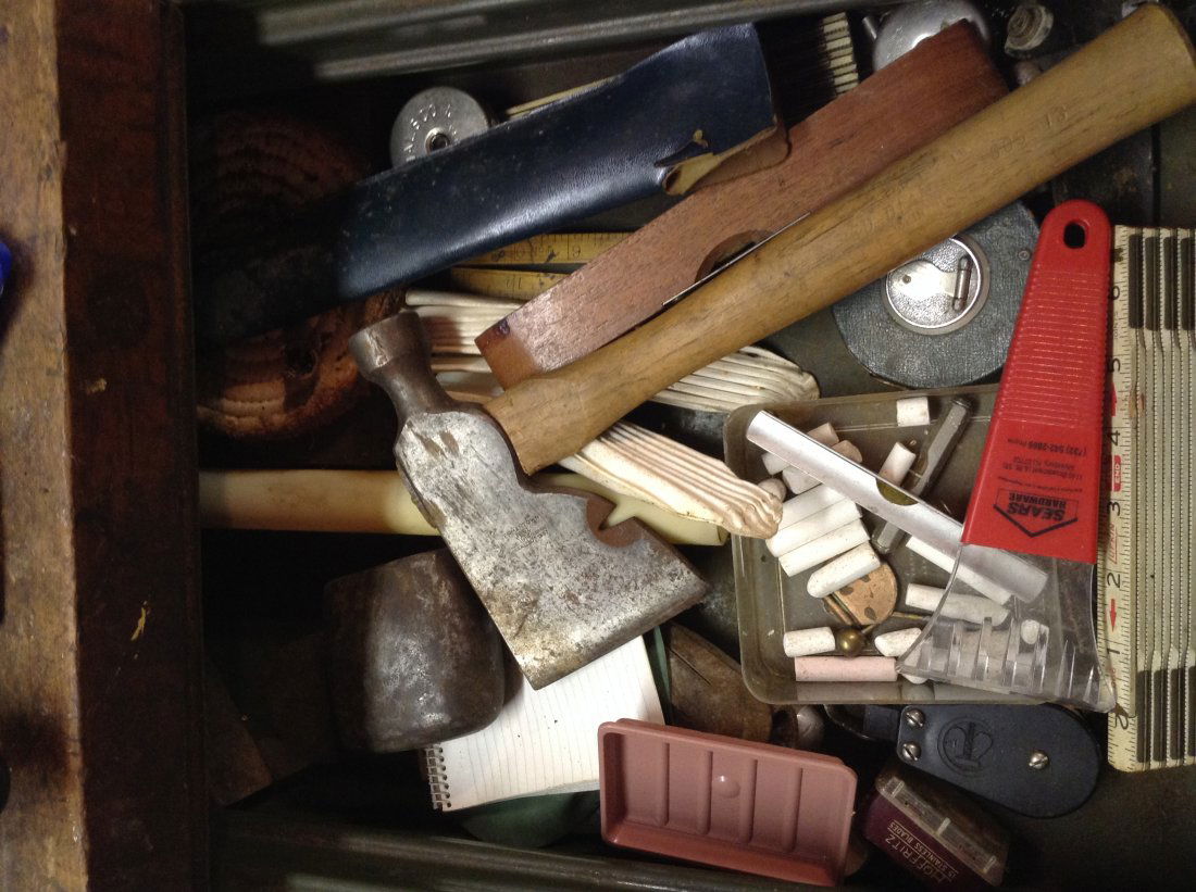 Contents of drawer on wood bench (1 of 1)