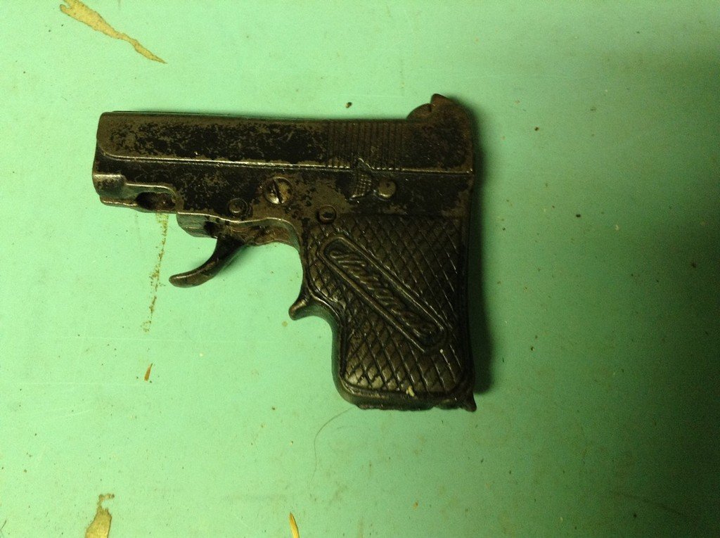 National Cast Iron cap gun: National Cast Iron cap gun as seen in photos