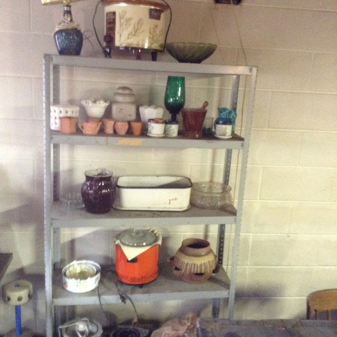 Contents of metal shelving rack (1 of 4)