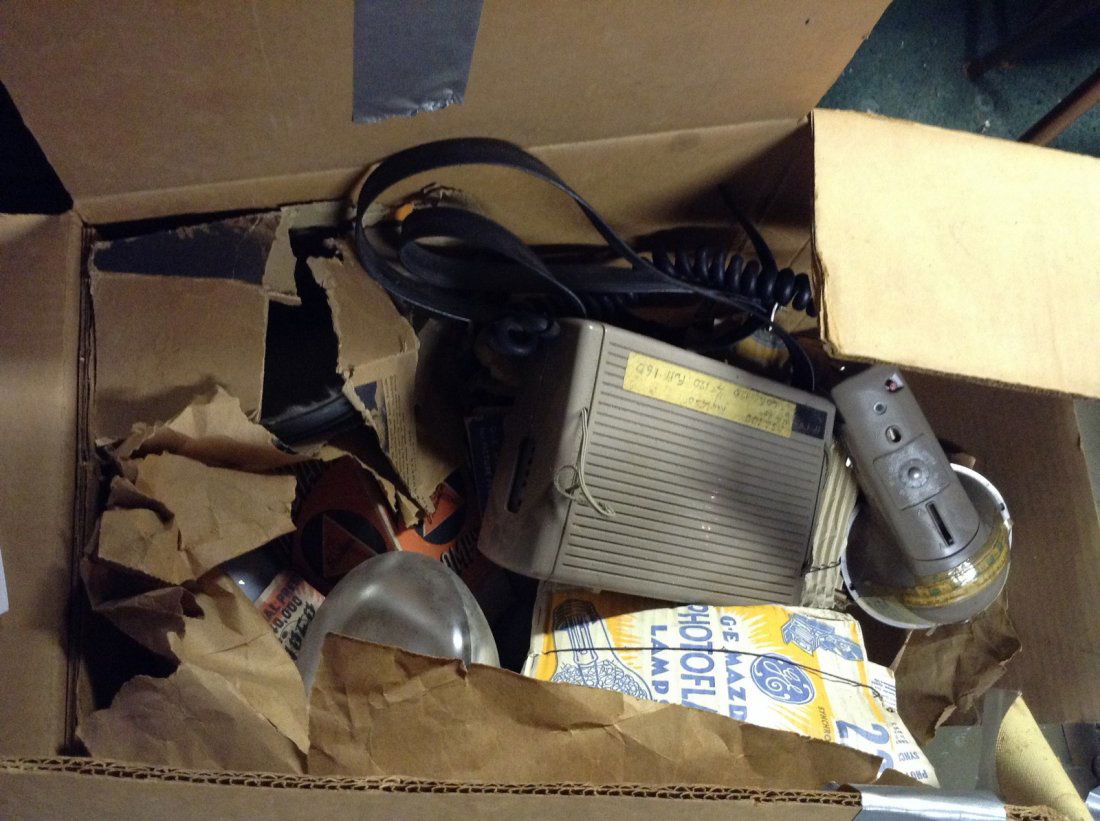 Metal cabinet and box full of camera bulbs (1 of 2)