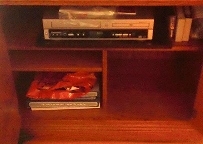 Panasonic DVD/ VHS player with booklets; photo albums (1 of 1)