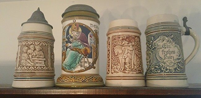 4 German marked Beer Steins; One is a Mettlach (1 of 1)