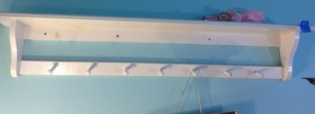 Wood shelf / coat rack on wall: 48 inches long x 10 inches wide