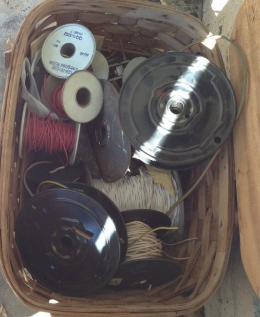 wicker basket full of spools of wire (1 of 1)